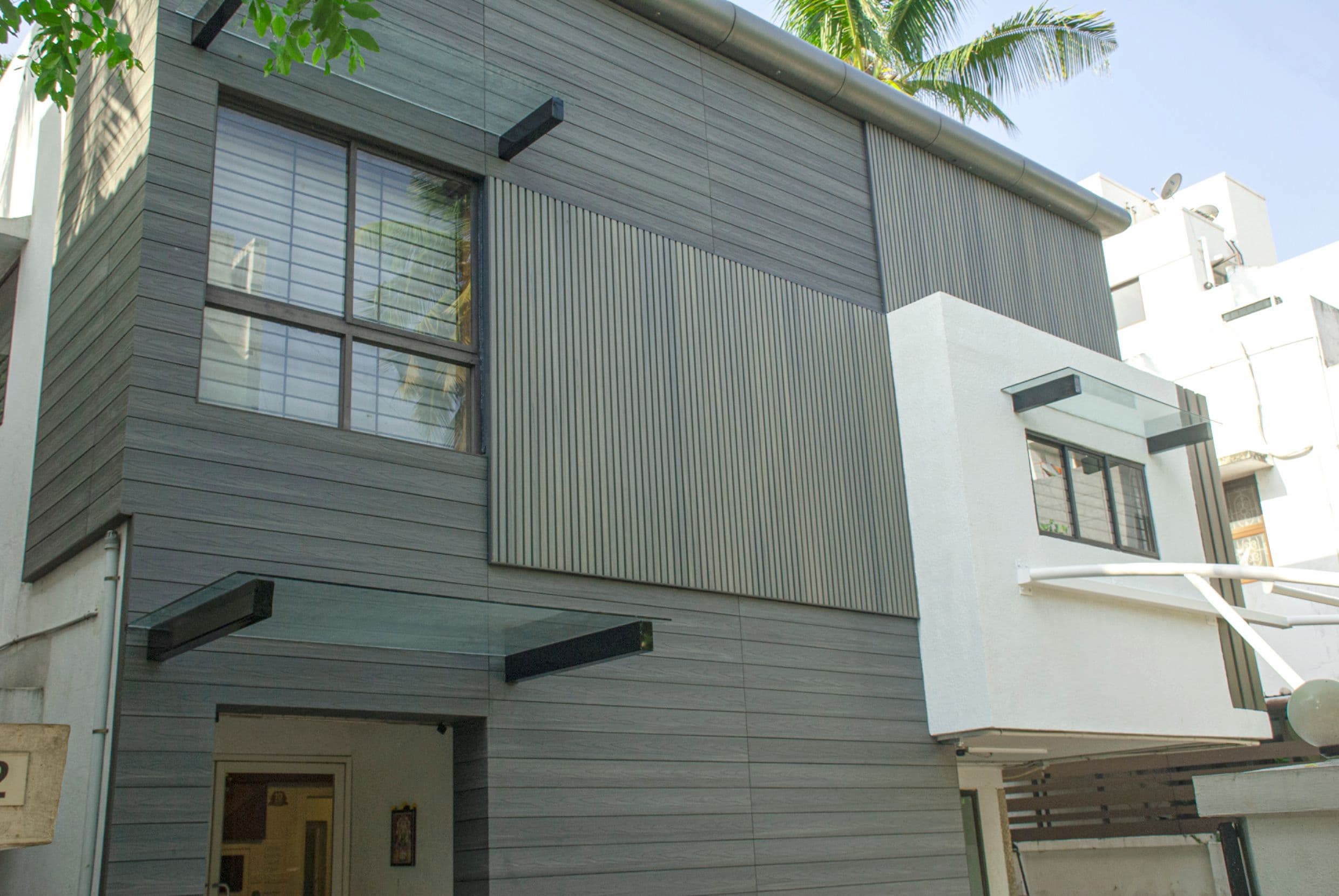 Modern building exterior with stylish WPC wall cladding